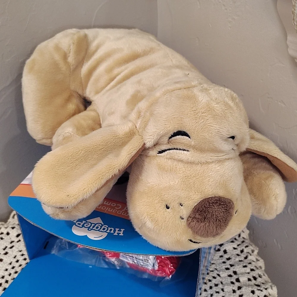 The HuggiePup is a cuddly behavioral aid toy Heartbeat Heatpack